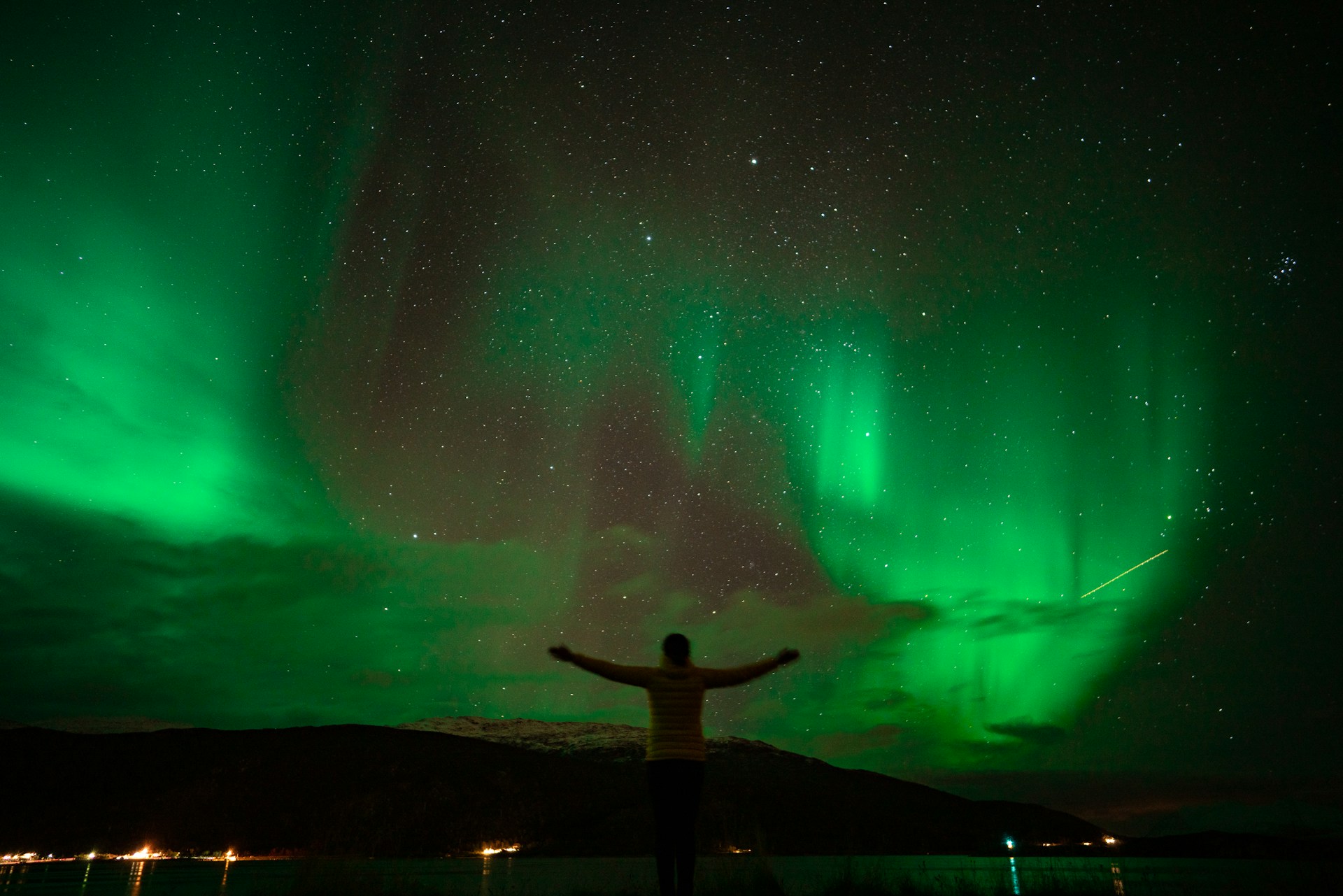 triumphant-man-northern-lights-tour-tromso-norway
